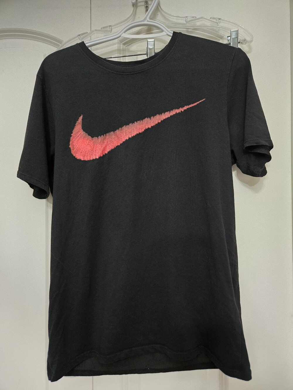 Nike Men's Black T-Shirt with Red Swoosh